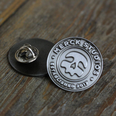 Merck Studios Pin